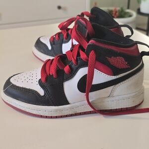 Nike Air Jordan  Kids Black and White Sneakers with Red Laces
